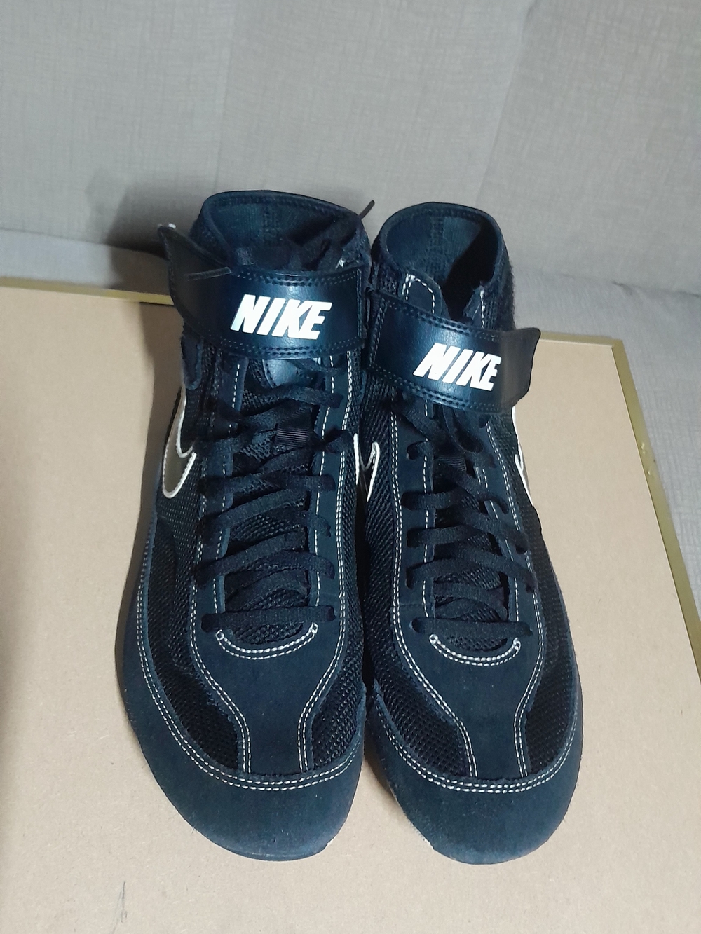 Nike Black High-Top Sneakers with White Swoosh